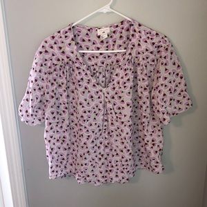 Floral short sleeved blouse.